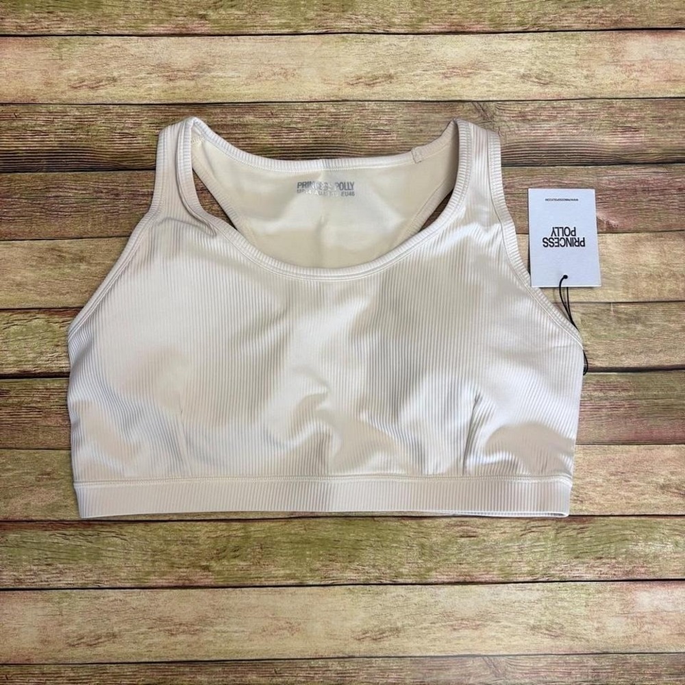 NWT Princess Polly Turbo Activewear Rib Top Latte color. New has pads